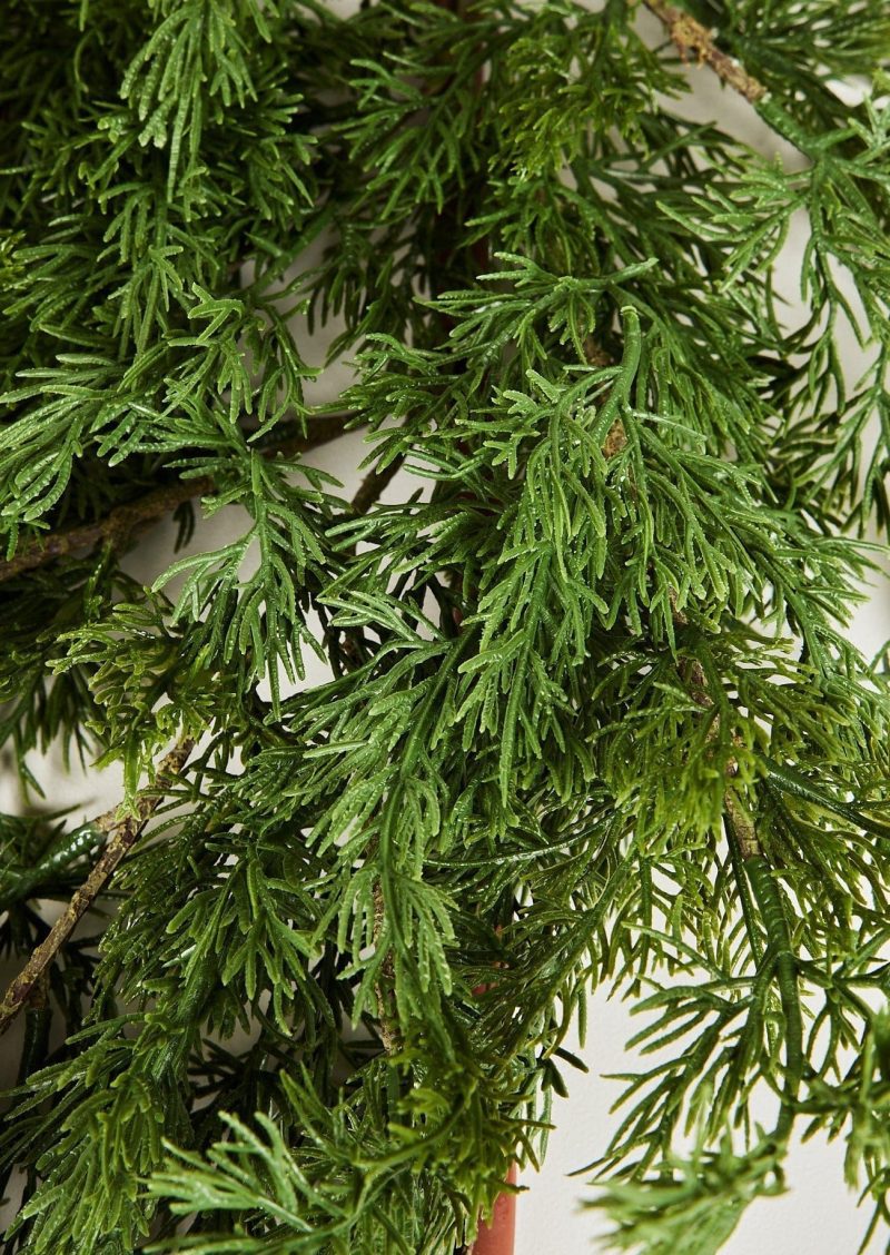 Closeup View of Artificial Winter Cedar Greenery Garland