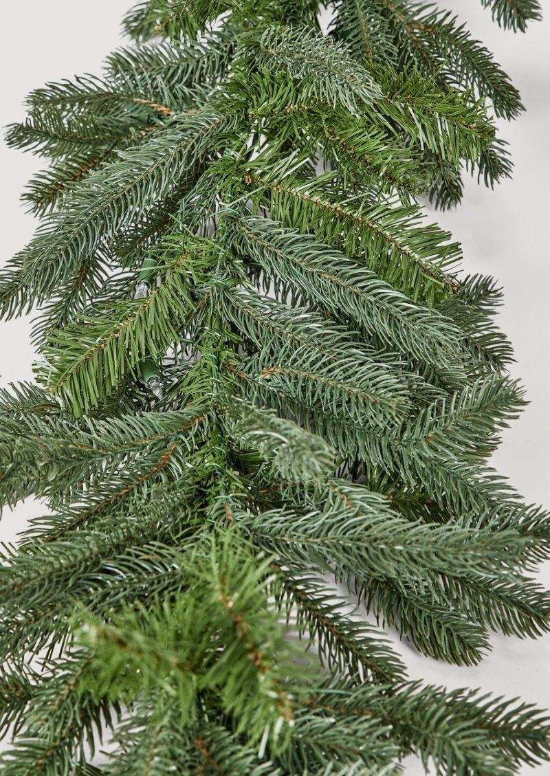 Closeup of Faux LED Spruce Holiday Greens Garland