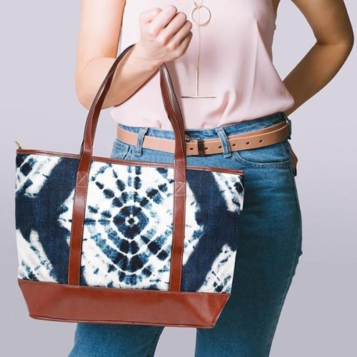 Model holding Wanderer Shibori Indigo Tote Bag 600x600 V1