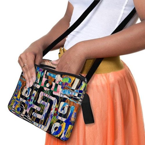 model holding Tribal Jones Traveler Crossbody bag 600x600 V2